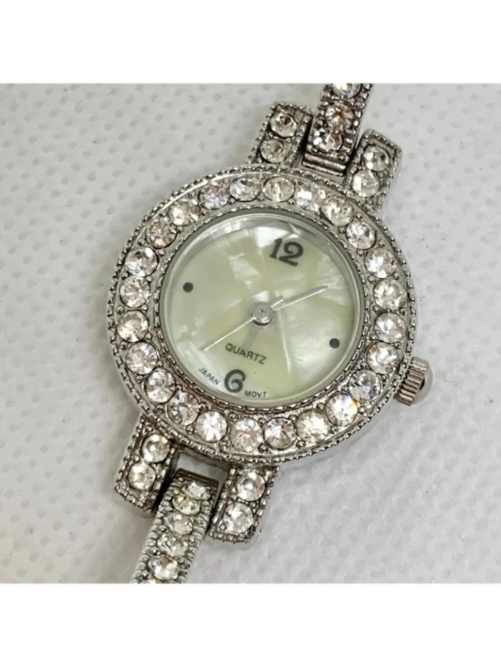 Women’s silver tone watch rhinestones quartz mop dial 21mm up to 7.5” running